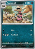 Krokorok 065/094 ME02: Phantasmal Flames Reverse Holofoil Pokémon TCG